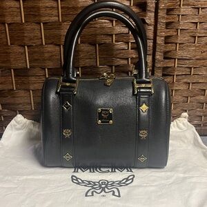 MCM Black Mini Satchel with Gold Accents